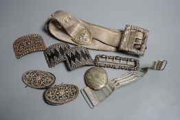 An Indian metal belt, four assorted metal shoe buckles and an aesthetic engraved silver plated vesta