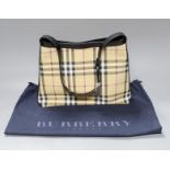 A Burberry shoulder bag with original receipt and dust bag,24 cms high x 30 cms wide,