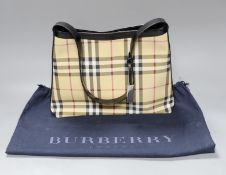 A Burberry shoulder bag with original receipt and dust bag,24 cms high x 30 cms wide,
