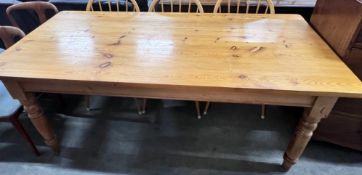 A Victorian style rectangular pine kitchen table, length 183cm, width 86cm, height 76cm