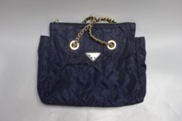 A vintage Prada nylon quilted shoulder bag with blue Prada Certificate of Authenticity, 30cm wide