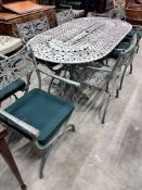 A Victorian style aluminium twin pedestal garden table and eight elbow chairs with seat pads,