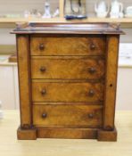 A Victorian figured walnut table top Wellington collector’s chest,51 cms high x 43 cms wide,