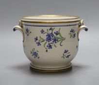 An early 19th century Paris porcelain cache pot or glass cooler with two handles painted with