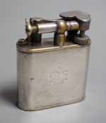 A vintage 1930’s Dunhill Unique Sports plated nickel cigarette lighter.