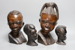 A selection of four African carved busts, Tallest 29cm