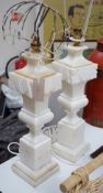 A pair of white marble table lamps,50 cms high including light fitting,