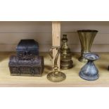 A Continental gilt brass casket, a pair of brass candlesticks, a pewter casket, another candlestick,