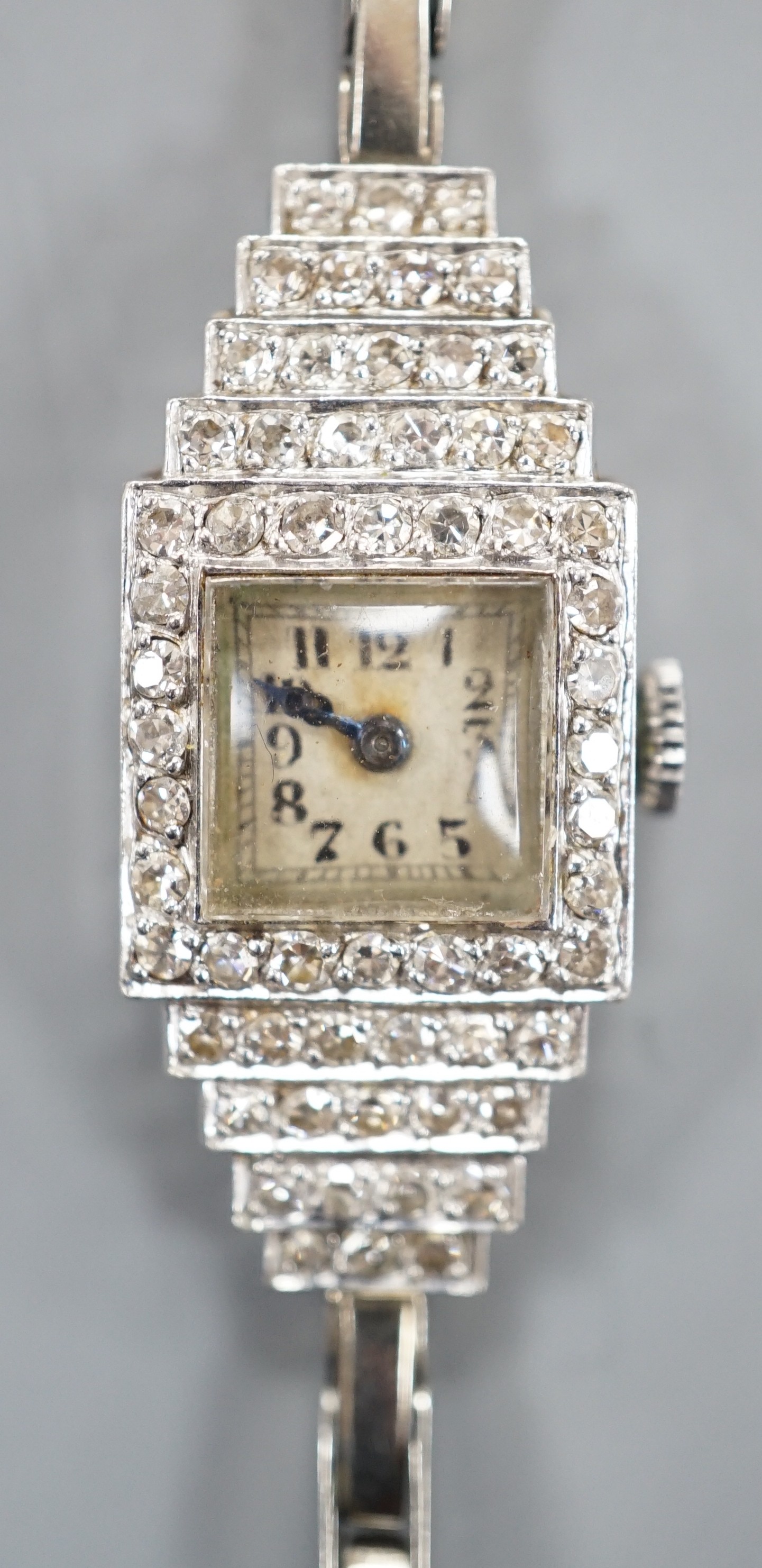 A lady's mid 20th century white metal (stamped platinum) and diamond cluster set Vertex cocktail
