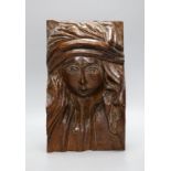 A carved oak figural appliqué,28.5 cms high,
