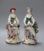 Two Derby groups of a shepherdess and a sheep, c.1765,21 cms high,