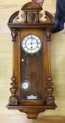 A 19th century German walnut wall timepiece,89 cms high,