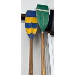 Two vintage wood oars, one by Aylings of Surrey with painted blades, larger length 384cm