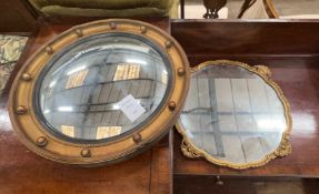 A Regency style circular convex wall mirror, diameter 45cm together with one other circular wall