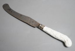 A Chelsea blanc de chine knife handle moulded with entwined branches and flowerheads, with silver