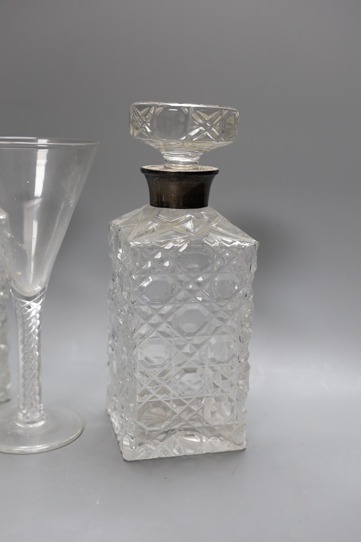 A pair of silver mounted cut glass decanters and stoppers and an air twist stemmed goblet, - Bild 4 aus 4