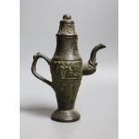 A Chinese archaistic bronze pouring vessel and cover, 17th/18th century,22cms high,