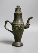 A Chinese archaistic bronze pouring vessel and cover, 17th/18th century,22cms high,