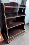 A Thomas Messel Regency style coromandel lacquer parcel gilt graduated open bookcase,