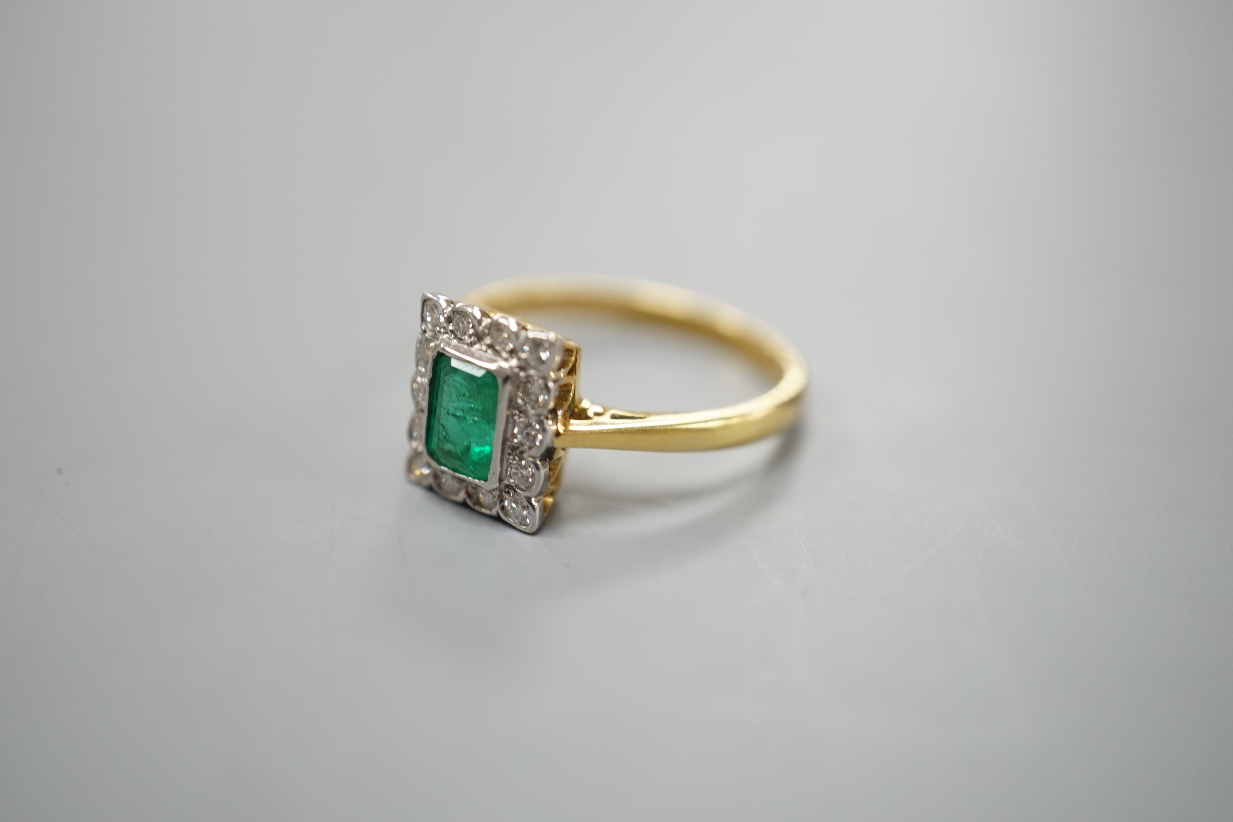 A modern 18ct gold, emerald and diamond set rectangular cluster ring, size N, gross weight 3.4 - Image 3 of 4