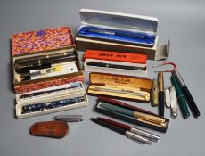 A group of fountain pens and pencils including a Waterman's ideal gold mounted pen,