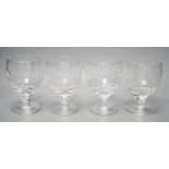 A set of four commemorative 1953 ER II coronation etched wine goblets, 14cms high