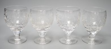A set of four commemorative 1953 ER II coronation etched wine goblets, 14cms high