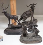 Four bronze animal groups, three foxes, a ram, a stag and two dogs,tallest stag 40.5 cms high,
