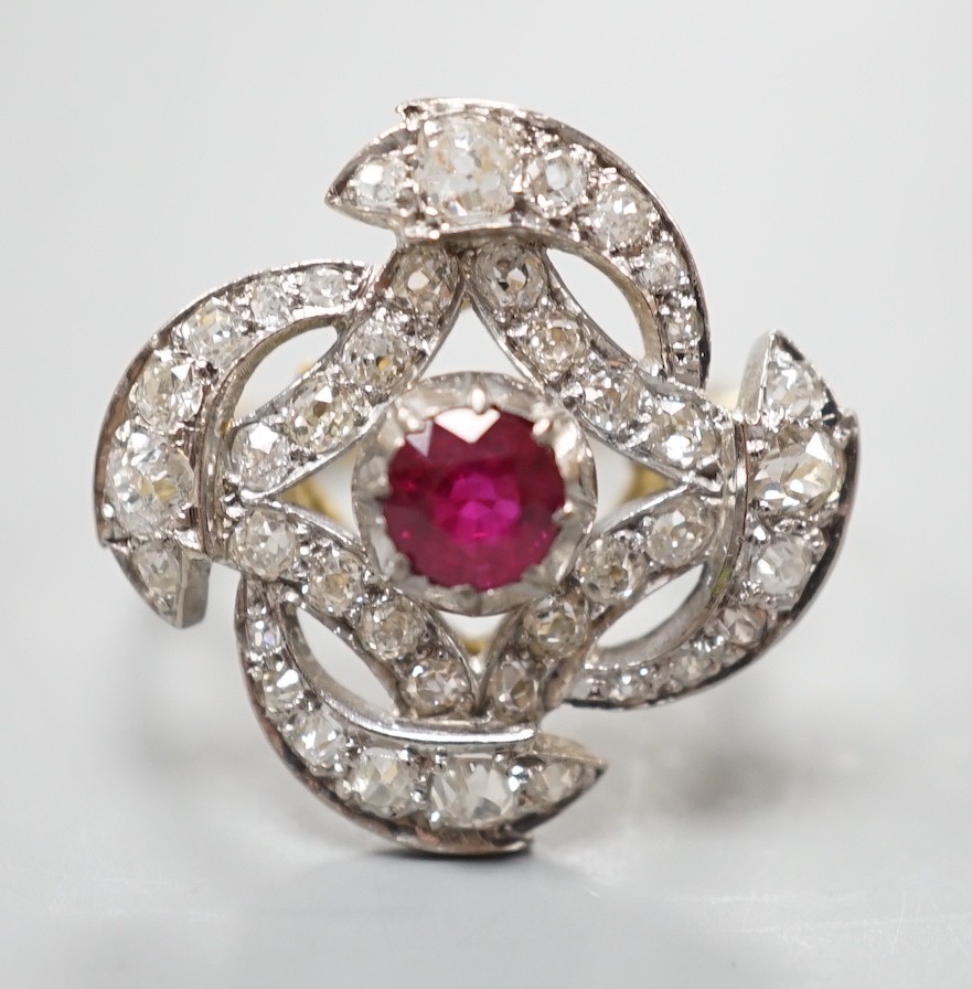 A yellow metal, ruby and diamond cluster set dress ring, in a pierced scroll setting, size O, - Image 2 of 5