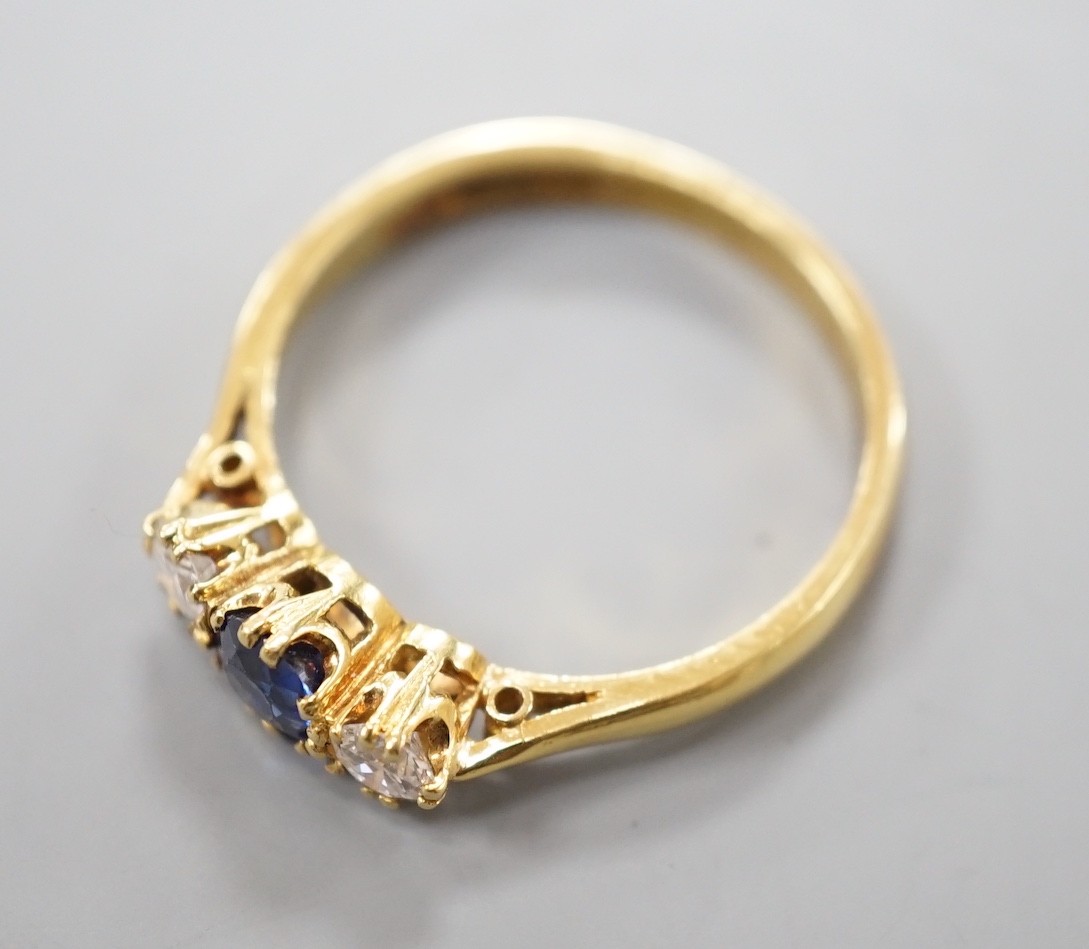 A modern 18ct gold, sapphire and diamond set three stone ring, size S, gross weight 4.4 grams, the - Image 3 of 4