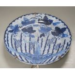 An 18th century Arita blue and white dish, 34cm