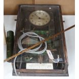 A Gents electric wall clock, 57 cms high,