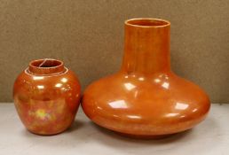 A Ruskin orange lustre vase, dated 1914 and a similar ginger jar, dated 1920, tallest 19cm