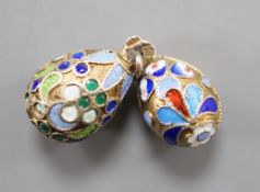 An early 20th century Russian 84 zolotnik and polychrome cloisonné enamel set egg pendant, maker's