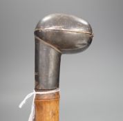 An unusual silver mounted walking stick with pipe containing handle 89cm