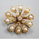 A Victorian yellow metal (tests as 15ct), diamond and split pearl set pendant brooch, 26mm, gross