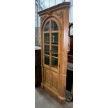 A George III style pine barrel back standing corner cabinet, width 100cm depth 32cm height 207cm