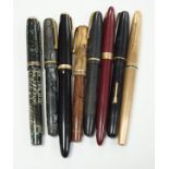 Four Parker fountain pens and four others