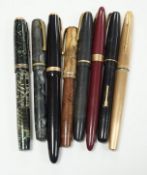 Four Parker fountain pens and four others