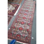 A North West Persian blue ground geometric runner 390cm x 88cm