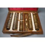 A 19th / 20th century mahogany cased optician's set,37.5 cms wide x 29.5 cms deep,