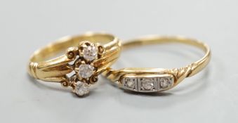 Two early 20th century 18ct and three stone diamond rings, sizes I and R/S gross weight 5.1 grams.