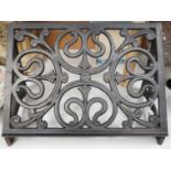 An ornate cast iron single lecturn, 47cms wide x 28cms high