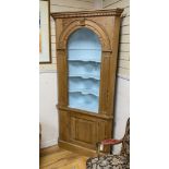 A George III style pitch pine standing corner cupboard, width 96cm, depth 38cm, height 210cm