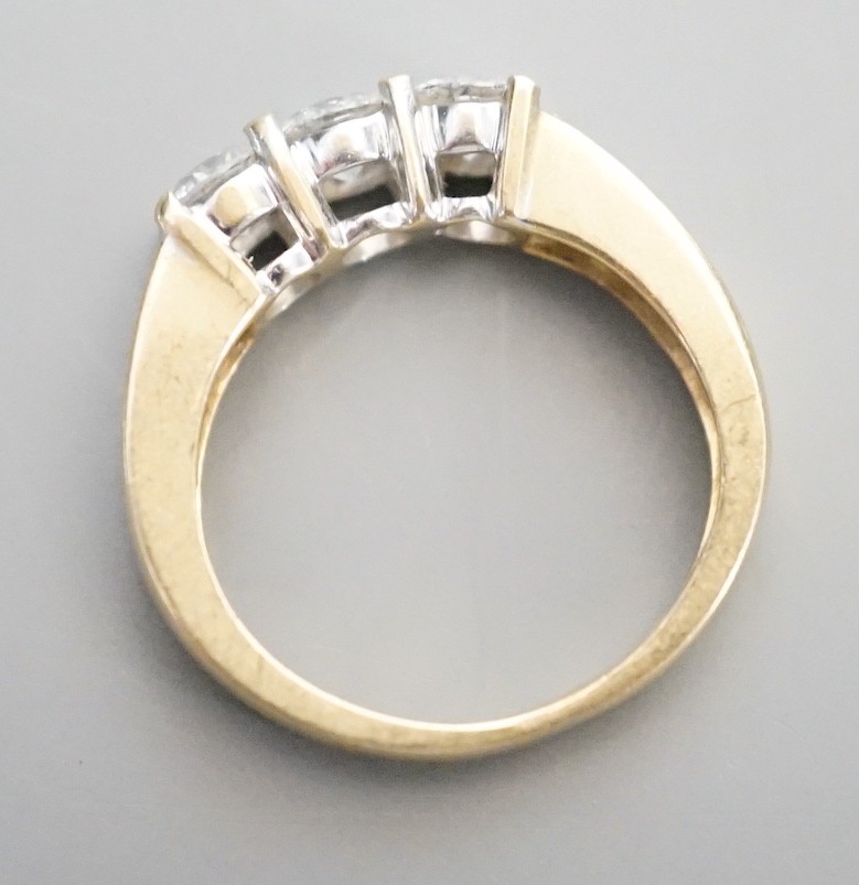 A 14k yellow metal and three stone diamond ring, with four stone diamond set shoulders, size K, - Image 5 of 5