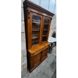 A Victorian oak bookcase cupboard, width 104cm depth 42cm height 200cm