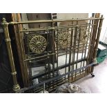 A Victorian brass footboard width 155cm