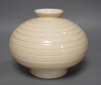 An unusual Keith Murray for Wedgwood buff-glazed vase, 16cm