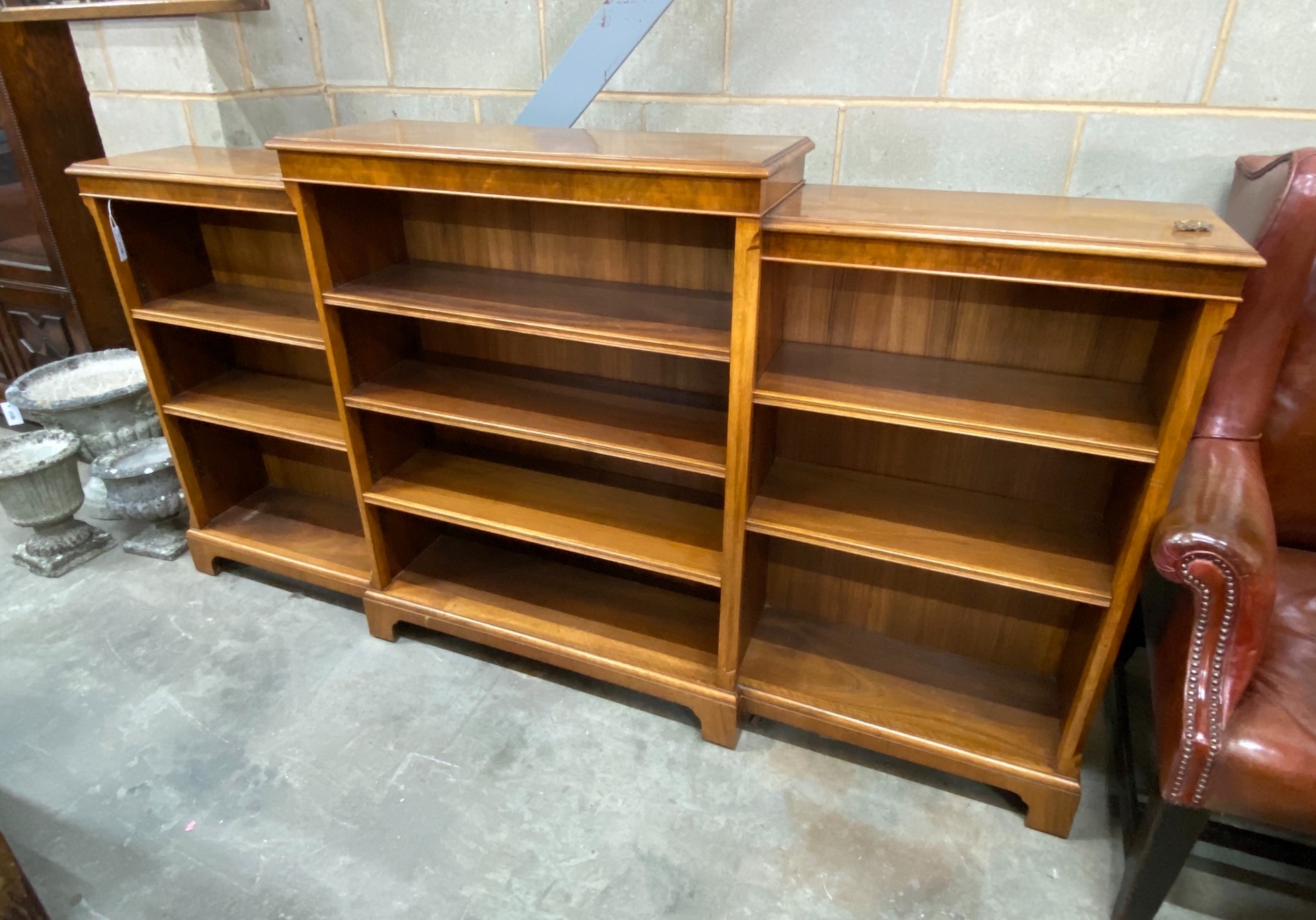 A mahogany open dwarf breakfront bookcase, width 213cm, depth 33cm, height 115cm