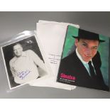 A photo of Sinatra, signed by him, along with a book on him and a copy of his will.
